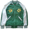 Green and white jacket with embroidered designs on a white background