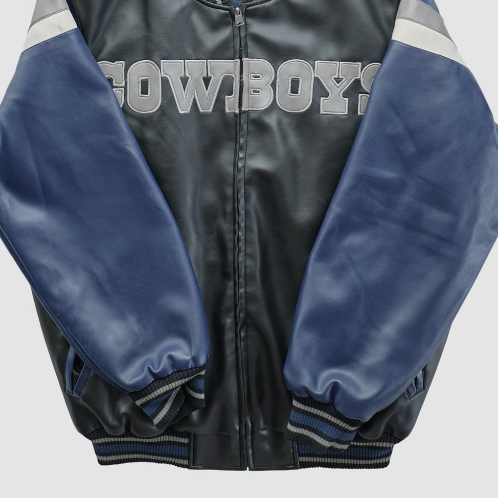 Folded jacket showing sleeves and chest