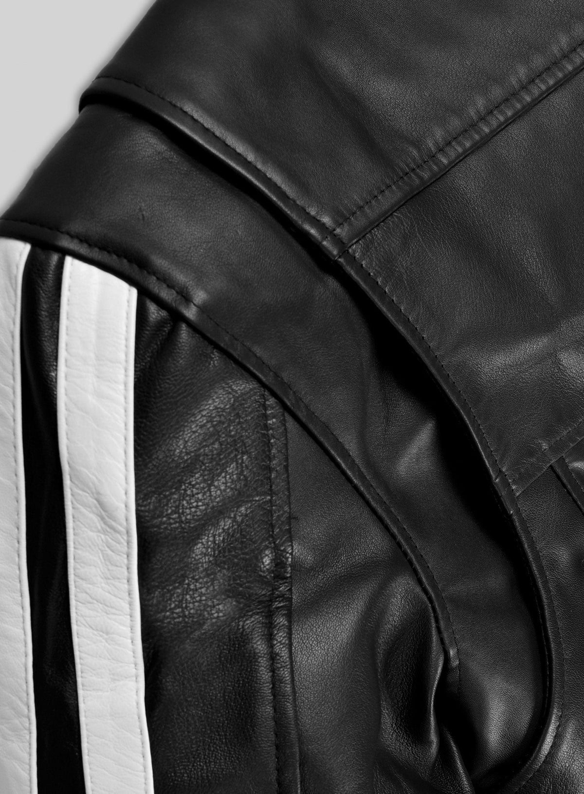 Robert Pattinson Damsel Black Striped Leather Jacket – close-up detail of leather and stitching