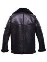 Black leather jacket with fur collar on a plain background