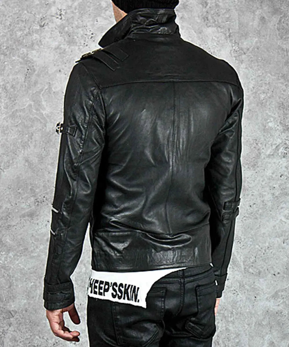 Black leather jacket with visible branding on a gray background
