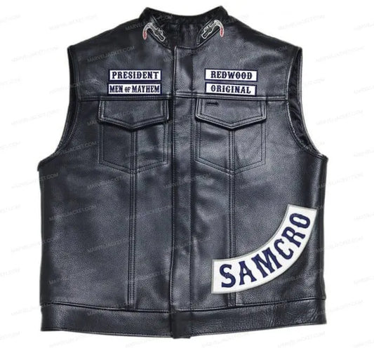 Black leather motorcycle vest with embroidered patches reading 'PRESIDENT MEN OF MATHEM' and 'REDWOOD ORIGINAL' on the chest, and a large 'SAMCRO' patch on the lower right side.