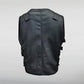 Black tactical vest on a gray background
