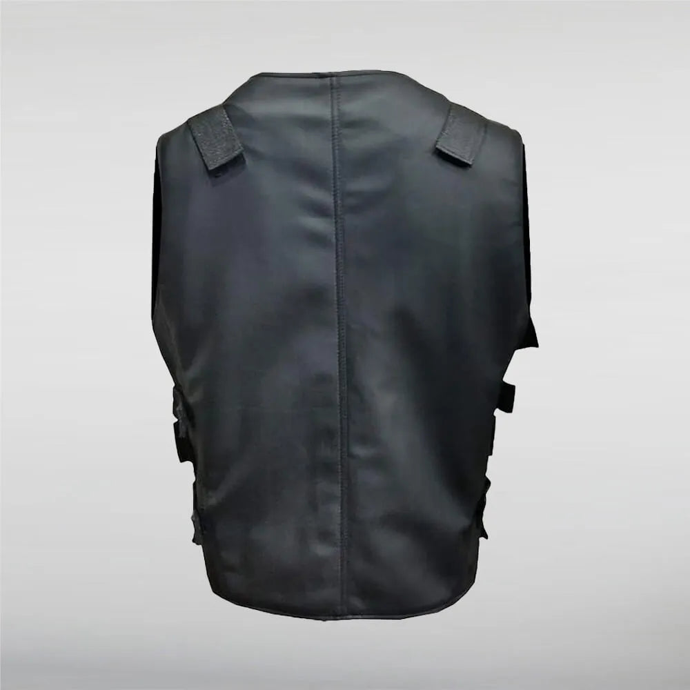 Black tactical vest on a gray background