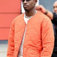 F1 2025 Damson Idris Orange Quilted Jacket – Recreated Edition