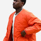 Damson Idris F1 The Movie Orange Jacket