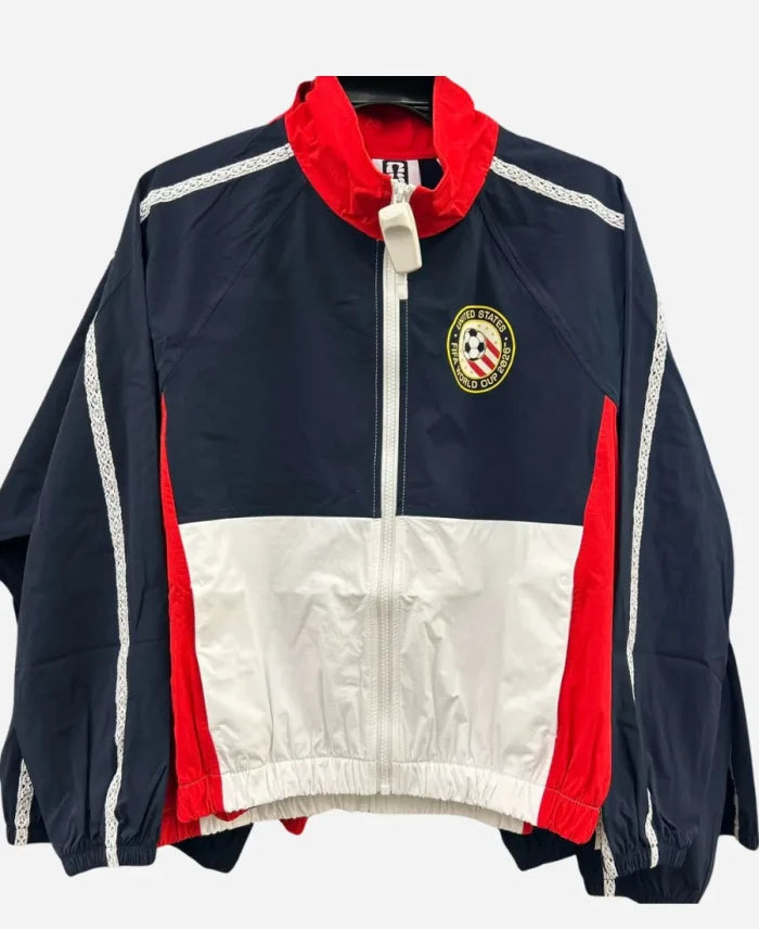 Navy, red, and white jacket with a logo on a white background