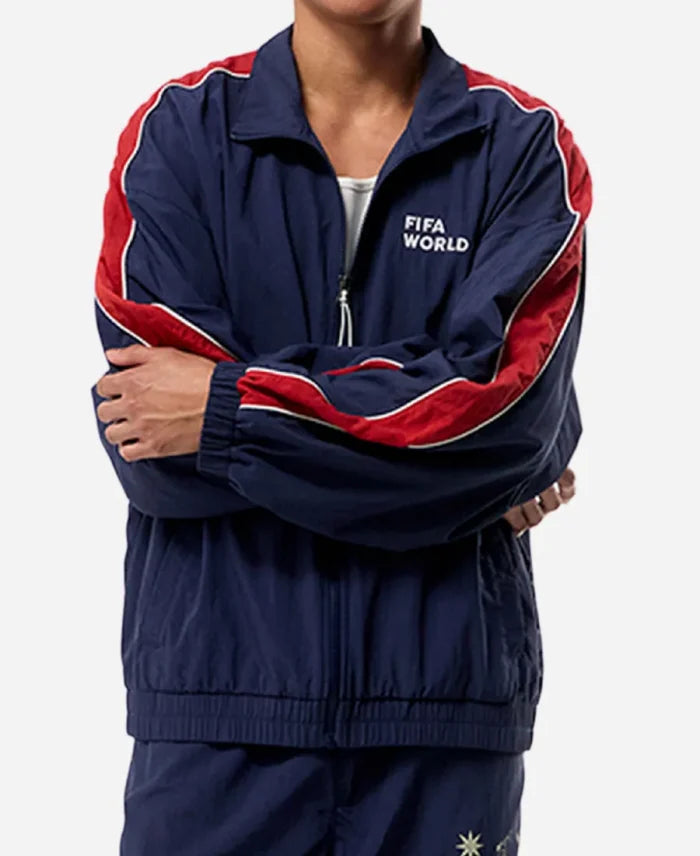 Navy tracksuit with red accents and 'FIFA World' text on a white background