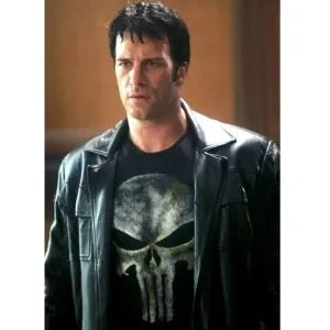 Person wearing a black leather jacket and a t-shirt with a skull design.
