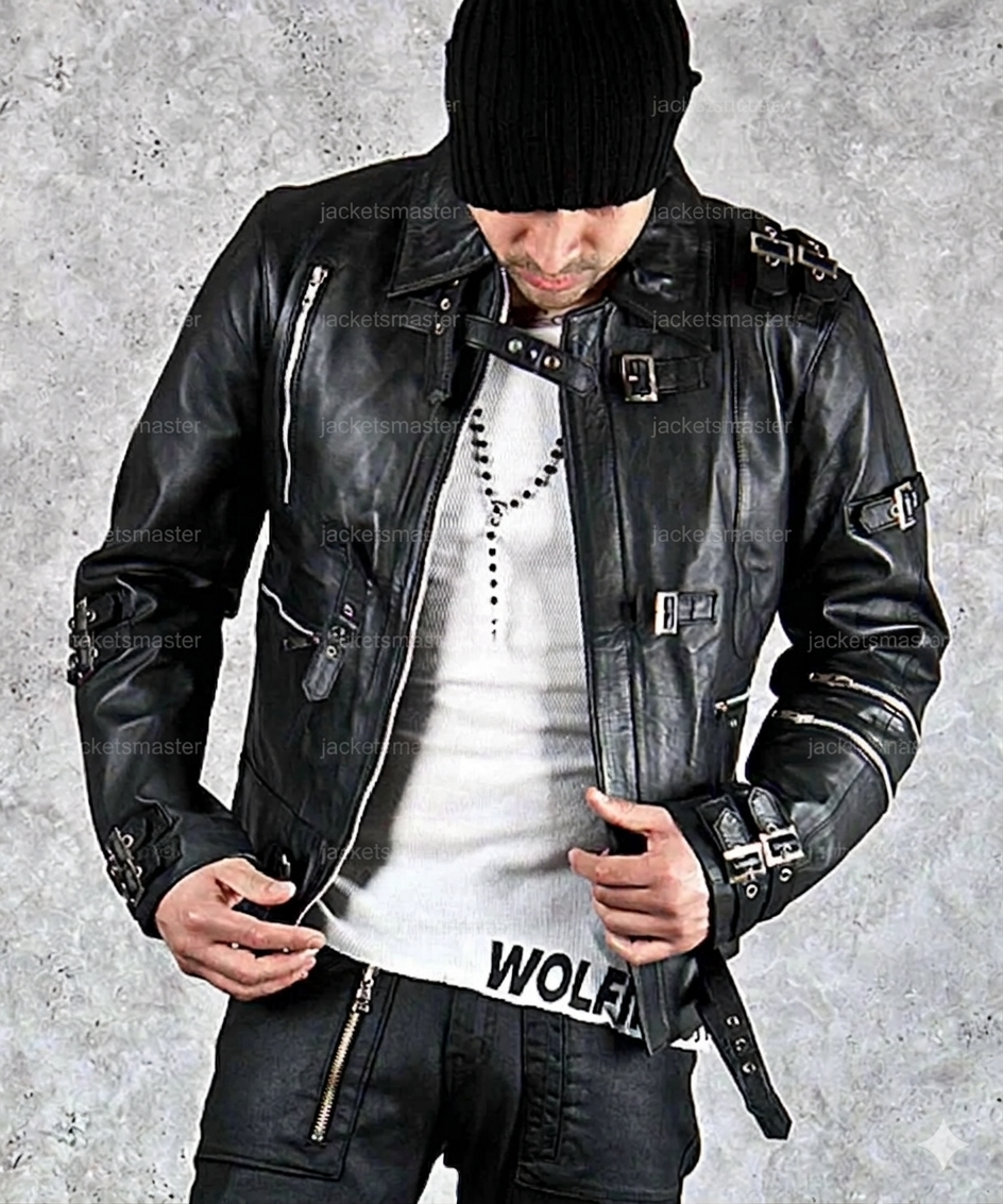 Person wearing a black leather jacket and white shirt with 'Wolves' text on a gray background