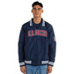 Person wearing a navy blue 'U.S. Soccer' jacket on a white background