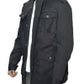 Person wearing a black coat with a hood in an urban setting