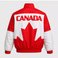 Red and white jacket with 'Canada' and a maple leaf design on a gray background