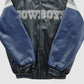 Folded jacket showing sleeves and chest