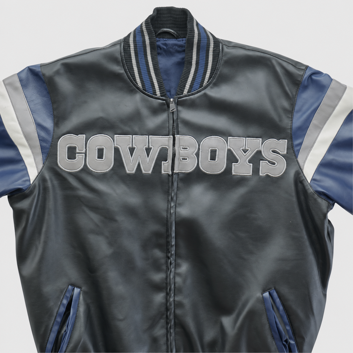 Front chest and collar detail without label