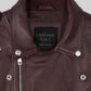 Joe Jonas Burgundy Biker Leather Jacket – close-up detail of hardware and pockets