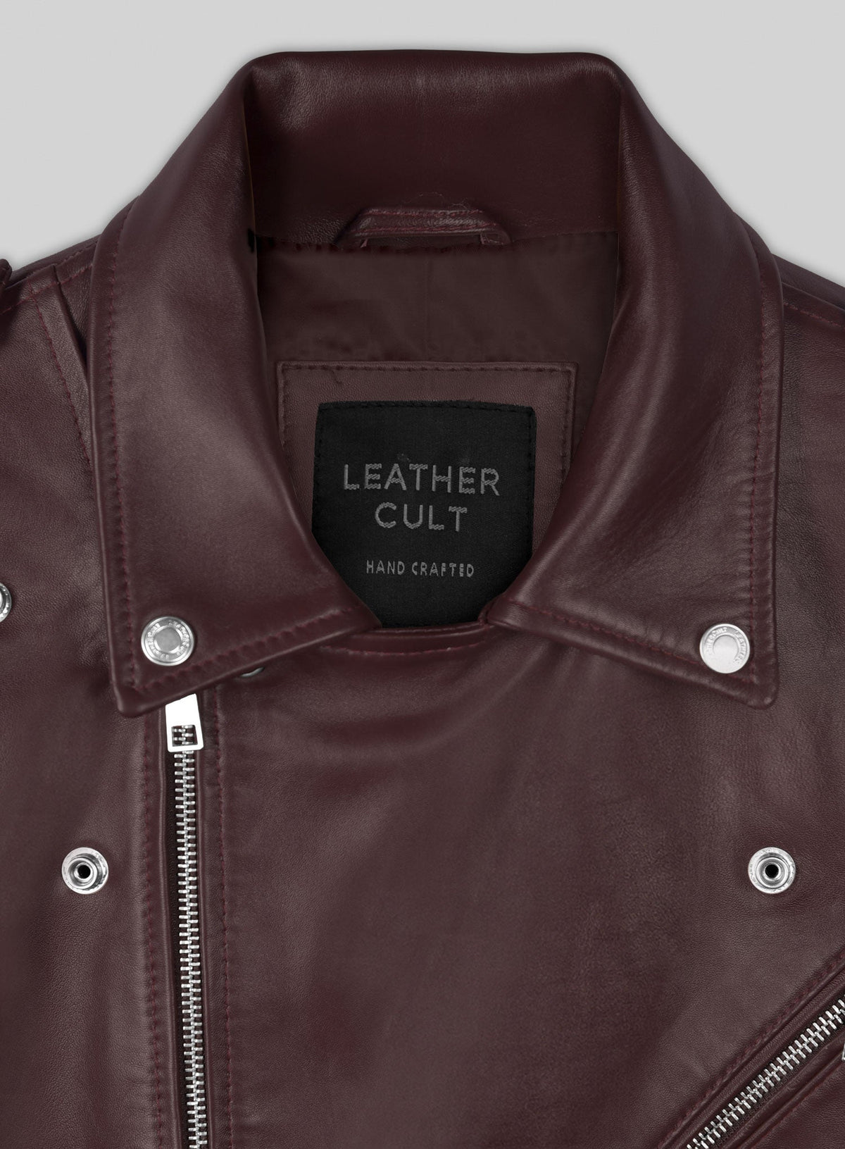 Joe Jonas Burgundy Biker Leather Jacket – close-up detail of hardware and pockets