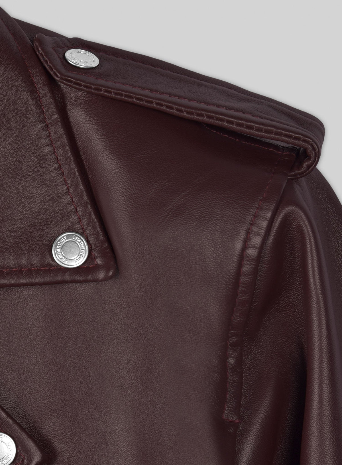Joe Jonas Burgundy Biker Leather Jacket – close-up detail of leather and stitching