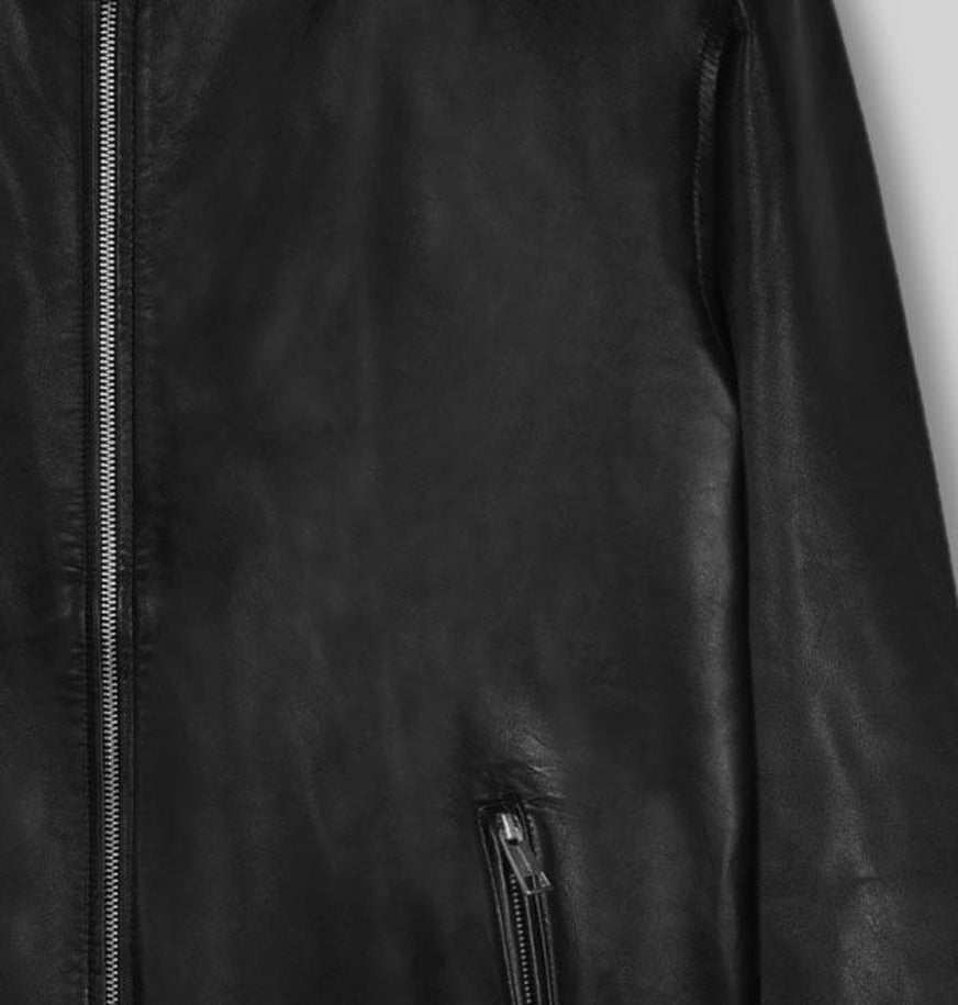 Mark Wahlberg Infinite Black Leather Jacket – close-up detail of front closure, pocket and leather stitching