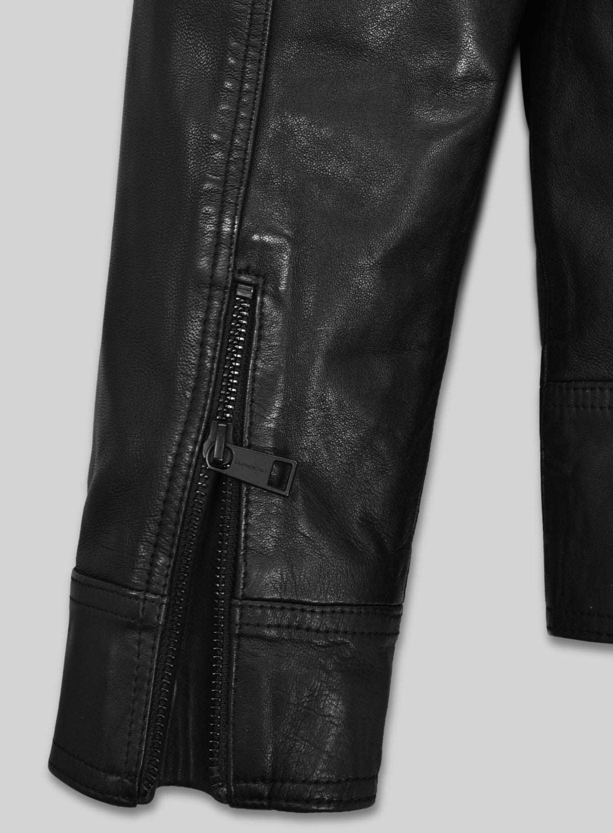 Sam Worthington Black Biker Leather Jacket – close-up and worn views