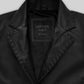 Zoe Kravitz Black Leather Long Coat – close-up and worn views